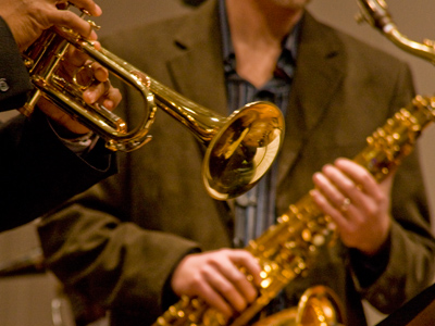 Trumpet`s up, sax is on deck.