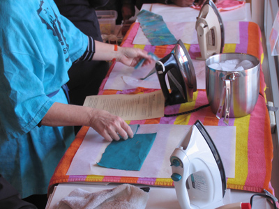 I`m not sure what she`s making, but if it takes three irons and a bucket of ice, it`s best to just get out of the way.