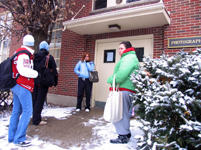 Photo majors waiting outside the photography studio (15 degrees and snowing) because the lab tech is late.