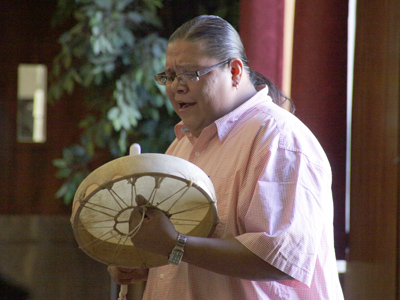 The hoop dancers` accompanist, Quentin Red Bear.