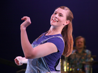 Both parents were performers, so she grew up dancing.