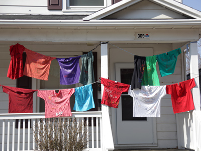Statements of women`s rights hanging on the line.