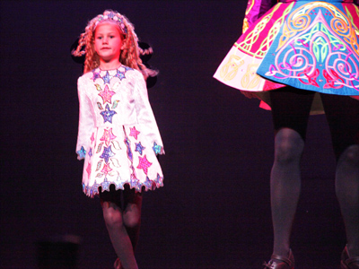 Despite her obvious disadvantage in size, Meaghen regularly participates in Irish dancing competitions.