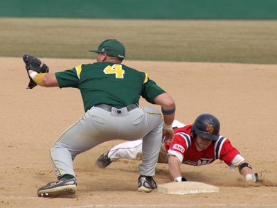 I had a good location from which to take photos, but nearly got hit by a ball a couple times.