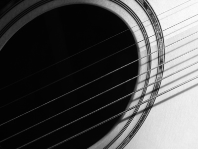 Sound hole and strings.
