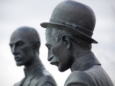 Wilbur and Orville argue over whose turn it is to put gas in the airplane.