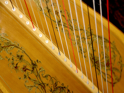 A harp sounds pretty and looks pretty.