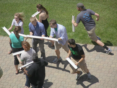 A teambuilding activity in the hot sun.