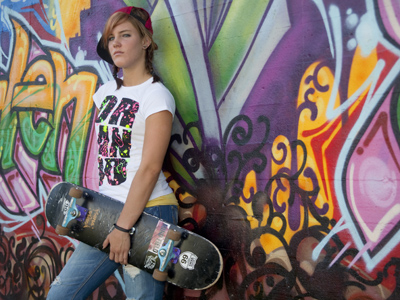 Photographing people in front of graffiti walls has reached the point of cliche, but if you`re going to do it, do it well.