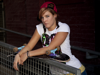 She`s the daughter of a wrestling coach, and a wrestler herself, but she doesn`t ACTUALLY ride a skateboard.