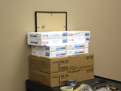 I put together this contraption to hold the pictures in place against the wall while I climb a ladder to string them up.