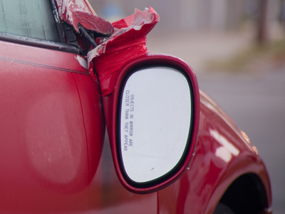 Objects in mirror are more vertical than they appear.