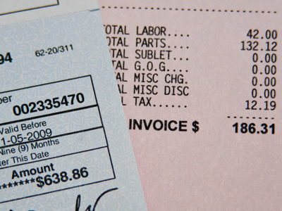 Insurance fraud made easy.  On the left is what I was paid to get my car repaired after a break-in (see October 30).  On the right is what it really cost.  Both the body shop and the insurance company suggested I keep the difference, but I voided the check and asked for a smaller one.