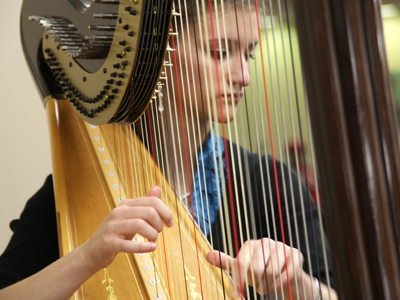 Even the most familiar Christmas songs are appealing when played on a harp.
