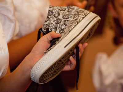 After the concert, the singers relax and kick off their shoes.