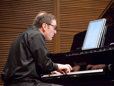 Someday technology will save us all, but for now it just eliminates the need to turn pages when playing piano.