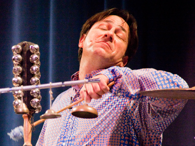 He also told me a joke:  `What do you call a guy who hangs around musicians?  A drummer.`  An oldie but a goodie.