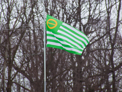 The ecology flag flies proudly in Yellow Springs.