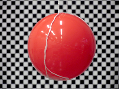 The ball is in focus, the background is blurry.