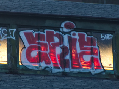 I shot this glowing graffiti as soon as I noticed it.  I moved a few feet to get a better angle and the sunlight had gone.