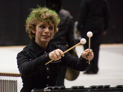 Many creative costumes and hairstyles are on display.