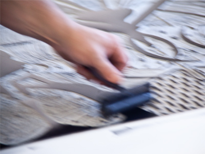 Printmaking with Ryan McCullouh, Step Two:  Roll ink onto the original.