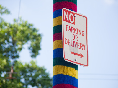 Someone was kind enough to knit a comforter for this utility pole.