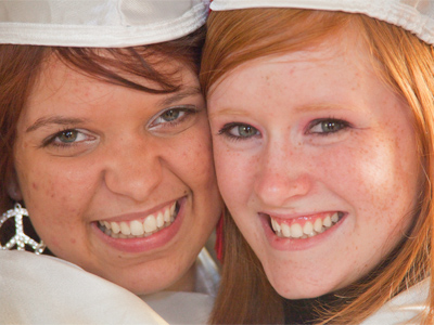 Previously seen together on September 28, 2008, they`re now celebrating high school graduation.