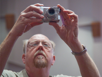 It used to be people would just sit quietly and watch and let the real photographer take pictures.