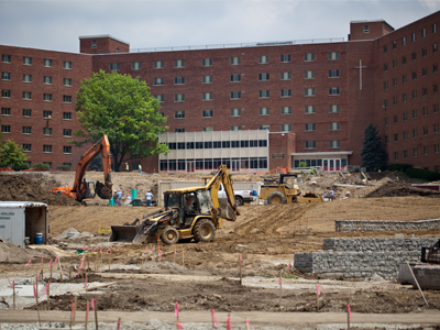 A nearby sign refers to this as `the greening of campus.`  That explains the tree slaying done on March 2, 2010.