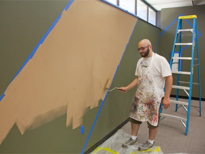 A student art project takes shape in the library.