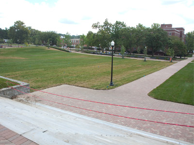 The new campus mall no longer has a diagonal pathway (see January 21, 2007).  It should take students about two weeks to recreate it by walking through the grass.