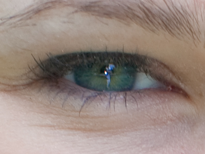 Me, reflected in the eye of someone I photographed today.