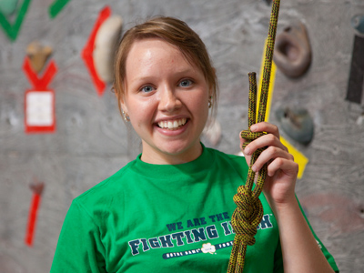 It would be very difficult for me to do what she`s doing.  Climbing a wall, yes, but also smiling and looking cute.