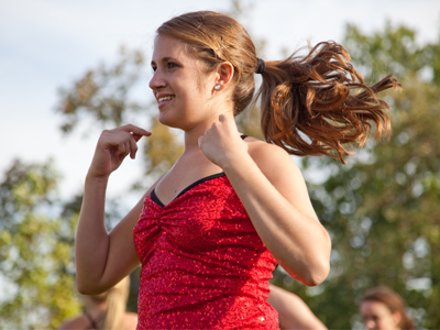 Dancer proves that a mass undergoing circular motion produces outward force away from the center of rotation.