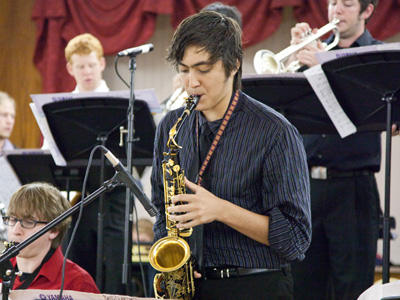 His saxophone is actually black with golden highlights.