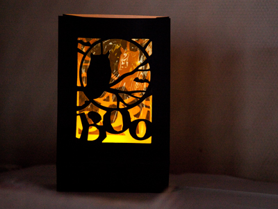 The surprise party starts in seven minutes, but for now I`ll take pictures of the decorations as we hide in the dark.