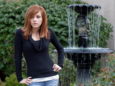 I spent a lot of time in Photoshop cleaning dog hair off of this girl`s black sweater.  It would`ve been easier to do it in real life with a lint roller.