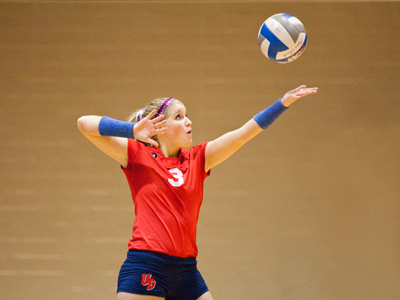 `Now serving for the Flyers, No. 3, Paige Vargas.`