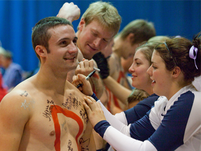 During the post-game autograph session, the forgetful frat boys had neglected to bring paper, and so the bashful volleyball players were reluctantly forced to improvise.