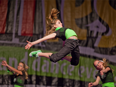 It`s not JUST the flying girl that makes this photo.  It`s the two in the corners, like cherubs in a Renaissance painting.