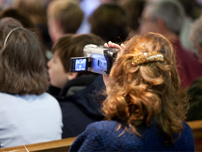 Why buy a professionally-produced DVD when you can shoot a shaky video yourself from the absolute last row?