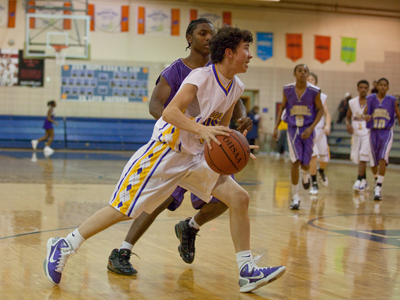 Taking it strong to the hoop, he got the basket and a foul.