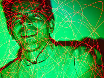 I hadn`t taken any disturbing self-portraits lately, so I thought it was time.  This is not a Photoshop creation; it`s what the camera saw (green light, red laser and me).