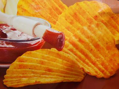How painstaking it must be to make these potato chips, basting each one with barbecue sauce.