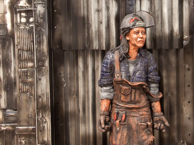 The Phelps brothers create realistic figures that often portray blue-collar disillusionment .