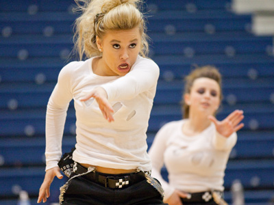 The 30 or so kids who performed in the halftime show, along with their families, doubled the size of the audience.