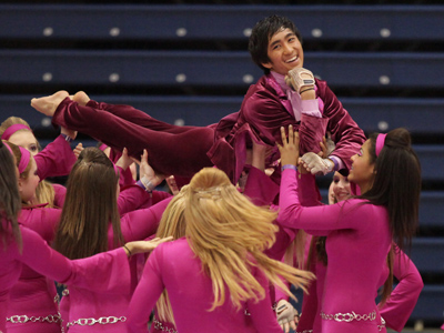 COLOR GUARD!!  He is the only male on his team.