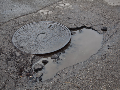 Like blooming flowers or returning birds, potholes are a sign of spring.