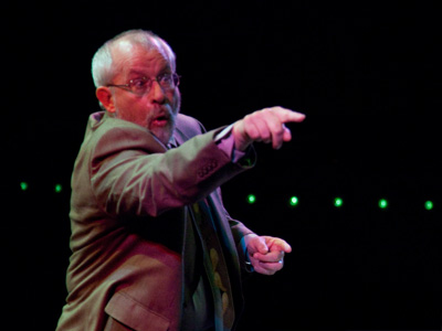 Capturing this conductor`s expression was my own work, but the little lights trailing off in the background were a gift.